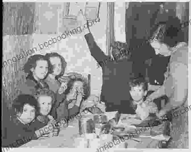 A Family Gathered Around A Dinner Table During The Second World War. This Must Be The Place: Dispatches Food From The Home Front