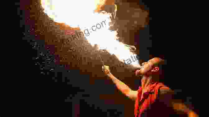 A Fire Eater Performing On Stage, Engulfed In Flames The Professional S Guide To Fire Eating