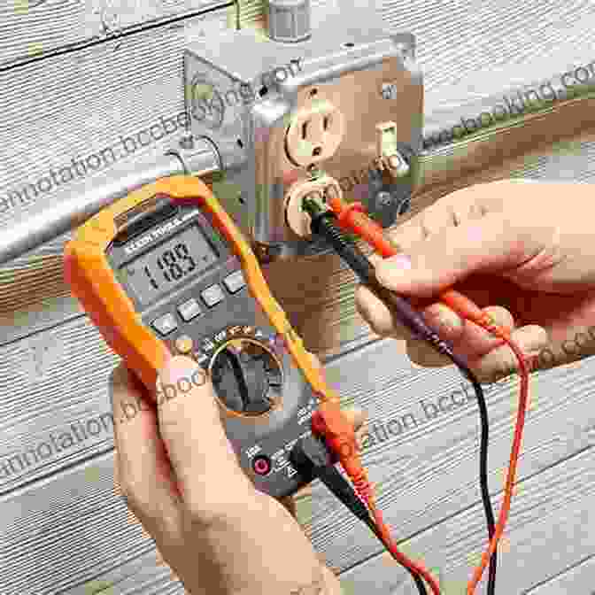 A Person Using A Multimeter To Test An Electronic Circuit Electronics For Absolute Beginners Gabriel Kline