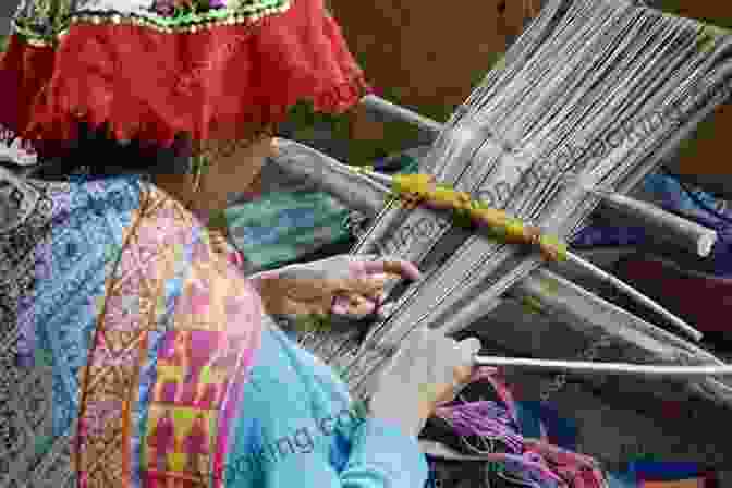 A Woman In Traditional Andean Attire Weaving At A Loom Trekking Peru: A Traveler S Guide