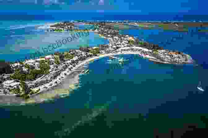 Aerial View Of Rum Point, Grand Cayman, Showcasing Its Pristine Beach, Turquoise Waters, And Iconic Beach Bar Rum Point Home Of The Mudslide : 50 Years Of History From Grand Caymans Favourite Beach Bar