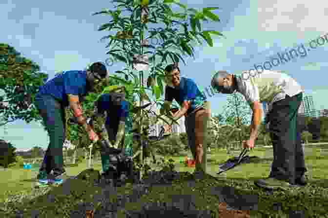Group Of People Planting Trees As Part Of A Conservation Effort Born To Be Wild: Celebrating New Life For Vulnerable Wildlife