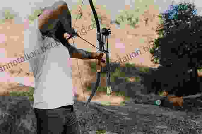 Image Of A Hunter Using A Bow And Arrow To Take Aim The Family Survival Gun C C Hunter