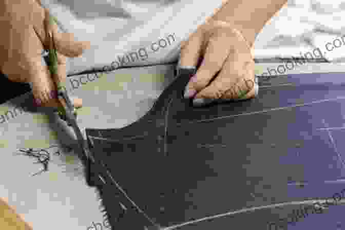 Image Of A Pattern Cutter Working On A Garment Pattern. Pattern Cutting For Menswear Gareth Kershaw