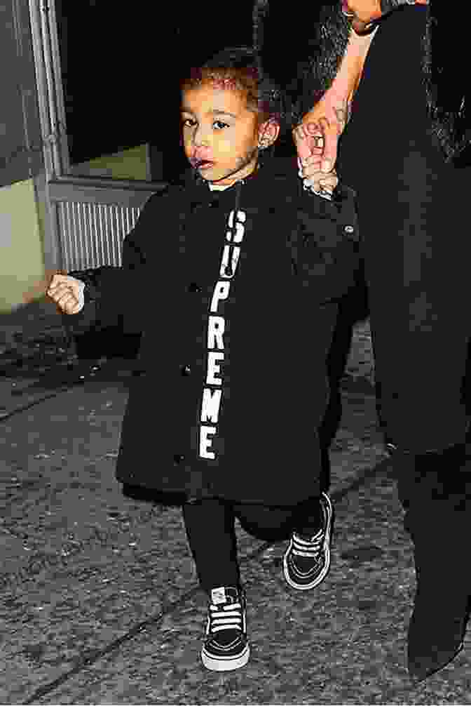 North West Wearing A Black Dress And White Sneakers Favorite Child Celebrities Who Dress Awesome Children S Fashion