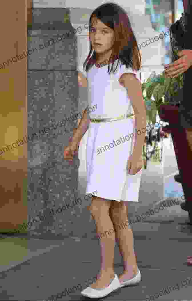 Suri Cruise Wearing A White Dress And Pink Shoes Favorite Child Celebrities Who Dress Awesome Children S Fashion