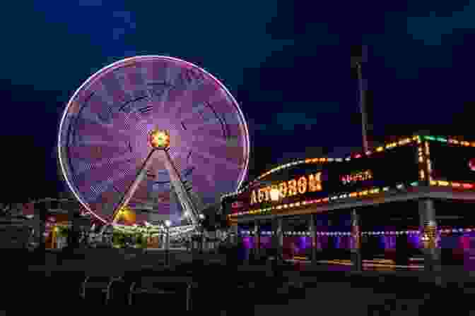The Ferris Wheel Illuminated At Night Mr Ferris And His Wheel